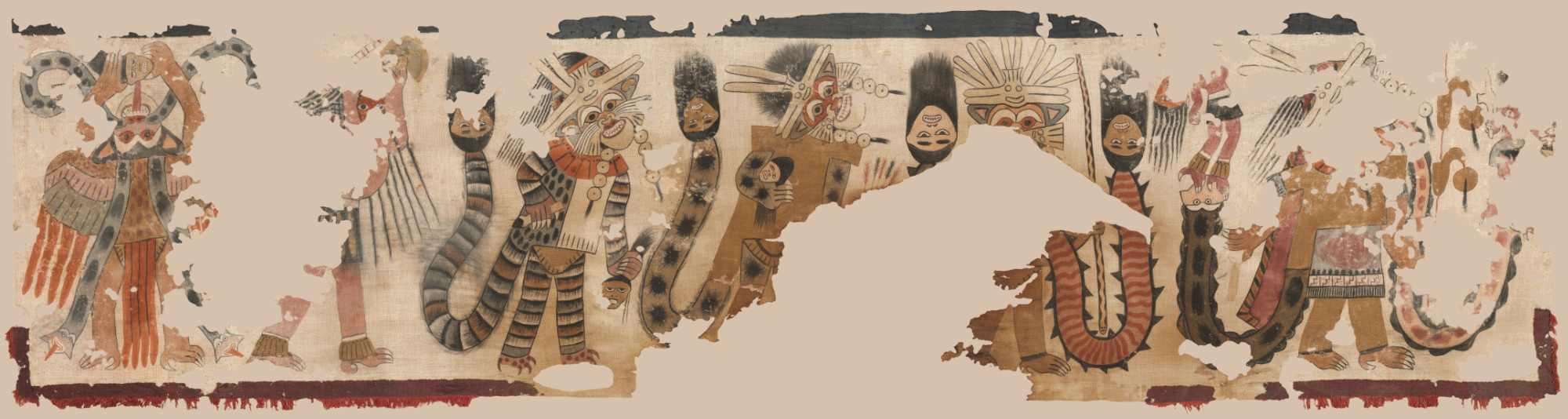 A heavily deteriorated horizontal panel cloth that depicts a procession of figures with animalistic features, facing left to right. The borders of the panel are dark red and blue while the central figures on the tan background are in shades of lighter blue and yellow.