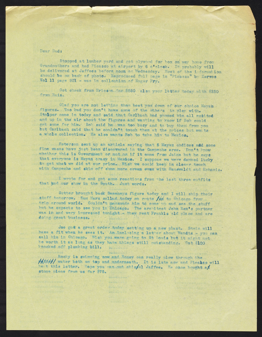 Typed letter with blue ink on yellowed paper
